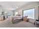 Spacious Primary bedroom with large windows and plush carpeting at 6002 N 5Th Pl, Phoenix, AZ 85012
