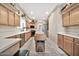 Spacious kitchen with light wood cabinets and tile flooring at 6002 N 5Th Pl, Phoenix, AZ 85012