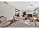 Spacious living room with a fireplace, built-in shelving, and comfortable seating at 6002 N 5Th Pl, Phoenix, AZ 85012