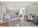 Spacious main bedroom with a work area and large bed at 6002 N 5Th Pl, Phoenix, AZ 85012