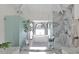 Spa-like bathroom with marble shower, soaking tub, and large window at 6701 N Scottsdale Rd # 24, Scottsdale, AZ 85250