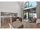 Bright dining area with a view of the kitchen and backyard at 6701 N Scottsdale Rd # 24, Scottsdale, AZ 85250