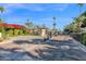 Community entrance with gated access and brick-paved driveway at 6701 N Scottsdale Rd # 24, Scottsdale, AZ 85250