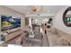 Comfortable living room with a large TV and cozy seating at 6701 N Scottsdale Rd # 24, Scottsdale, AZ 85250