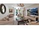 Spacious living room with large windows and comfortable seating at 6701 N Scottsdale Rd # 24, Scottsdale, AZ 85250