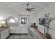 Bright main bedroom with vaulted ceilings, fireplace, and private balcony at 6701 N Scottsdale Rd # 24, Scottsdale, AZ 85250