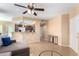 Living room with a view of kitchen and breakfast bar at 9450 E Becker Ln # 1009, Scottsdale, AZ 85260