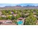 Aerial view of community pool and surrounding buildings at 15050 N Thompson Peak Pkwy # 2006, Scottsdale, AZ 85260