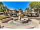Community features a central courtyard with a fountain at 15050 N Thompson Peak Pkwy # 2006, Scottsdale, AZ 85260