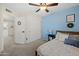 Bedroom with a full-size bed and built-in closet at 1705 E Windsong Dr, Phoenix, AZ 85048