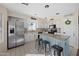 Kitchen with island, stainless steel appliances, and granite counters at 1705 E Windsong Dr, Phoenix, AZ 85048