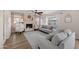 Living room with fireplace, hardwood floors and neutral color palette at 1705 E Windsong Dr, Phoenix, AZ 85048