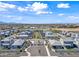 Aerial view showcasing the new community with uniform homes, landscaping, and neighborhood amenities at 2339 E Levi Dr, Phoenix, AZ 85040