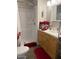 Updated bathroom with tub/shower combo and wood vanity at 2600 E Allred Ave # R87, Mesa, AZ 85204