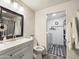 Clean bathroom with white vanity and laundry area at 2600 E Allred Ave # R87, Mesa, AZ 85204