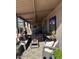 Enjoy the covered patio, complete with comfortable seating and seasonal decor at 2600 E Allred Ave # R87, Mesa, AZ 85204