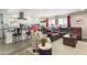 Open floor plan with modern kitchen and comfortable living room at 2600 E Allred Ave # R87, Mesa, AZ 85204