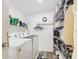 Convenient laundry room with washer, dryer, and storage at 2600 E Allred Ave # R87, Mesa, AZ 85204