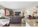 Spacious living room with large TV and comfortable seating at 2600 E Allred Ave # R87, Mesa, AZ 85204
