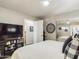 Main bedroom with large TV, ceiling fan and mirrored closet at 2600 E Allred Ave # R87, Mesa, AZ 85204