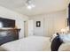 Spacious main bedroom with fireplace and built-in shelving at 2600 E Allred Ave # R87, Mesa, AZ 85204