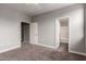 Bedroom with carpet, ceiling fan and access to bathroom at 2821 S Skyline Dr # 123, Mesa, AZ 85212