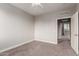 Bright bedroom with carpeted floors and ceiling fan at 2821 S Skyline Dr # 123, Mesa, AZ 85212