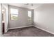 Bedroom with carpet, ceiling fan and large windows at 2821 S Skyline Dr # 123, Mesa, AZ 85212