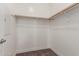Large walk-in closet with double hanging rods and neutral walls at 2821 S Skyline Dr # 123, Mesa, AZ 85212