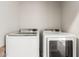 Laundry room with side-by-side Samsung washer and dryer at 2821 S Skyline Dr # 123, Mesa, AZ 85212