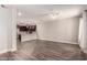 Open living room with hardwood floors and kitchen views at 2821 S Skyline Dr # 123, Mesa, AZ 85212