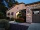 Beautiful home exterior with stone accents, desert landscaping, and attached garage at 28831 N 128Th Dr, Peoria, AZ 85383