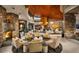 Inviting lobby with stone fireplace, vaulted ceilings, and comfortable seating area at 28831 N 128Th Dr, Peoria, AZ 85383