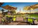 Outdoor recreation area with bocce ball courts, patio seating, and scenic views at 28831 N 128Th Dr, Peoria, AZ 85383
