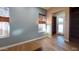 Cozy room with natural light, wood floors, and neutral paint at 28831 N 128Th Dr, Peoria, AZ 85383