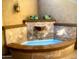 Custom tiled water feature with soothing sounds, great for relaxing in the sun at 28831 N 128Th Dr, Peoria, AZ 85383