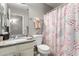 Clean bathroom, shower/tub combo, granite vanity at 3150 W Foothill Dr, Phoenix, AZ 85027