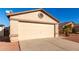 Tan house with a beige garage door and small front yard at 3150 W Foothill Dr, Phoenix, AZ 85027