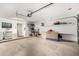 Garage with built-in shelving and laundry area at 3150 W Foothill Dr, Phoenix, AZ 85027