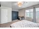 This bedroom offers ample storage space and natural light through a large window at 4600 N 68Th St # 313, Scottsdale, AZ 85251