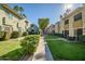 Beautiful condo exteriors featuring well-maintained landscaping and walkway to the parking at 4600 N 68Th St # 313, Scottsdale, AZ 85251