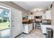 Charming kitchen offers granite counters, stainless appliances, and updated fixtures at 4600 N 68Th St # 313, Scottsdale, AZ 85251