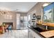 View of the kitchen featuring stainless steel appliances and breakfast area at 4600 N 68Th St # 313, Scottsdale, AZ 85251