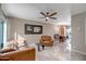 Open-concept living room with leather sofa and dining area at 4600 N 68Th St # 313, Scottsdale, AZ 85251