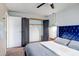 View of main bedroom with open closet, accent lighting and decor at 4600 N 68Th St # 313, Scottsdale, AZ 85251