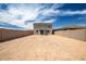 Large backyard with privacy fence and exterior view of home at 5534 W Banff Ln, Glendale, AZ 85306