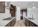 Modern kitchen with stainless steel appliances, sleek countertops, and subway tile backsplash at 5534 W Banff Ln, Glendale, AZ 85306