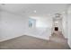Bright upstairs landing with carpet and white railings at 5534 W Banff Ln, Glendale, AZ 85306