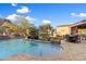 Inviting backyard oasis with a large pool and patio furniture at 15419 E Stardust Dr, Fountain Hills, AZ 85268
