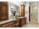 Elegant bathroom with vanity, walk-in shower, and wood cabinets at 15419 E Stardust Dr, Fountain Hills, AZ 85268